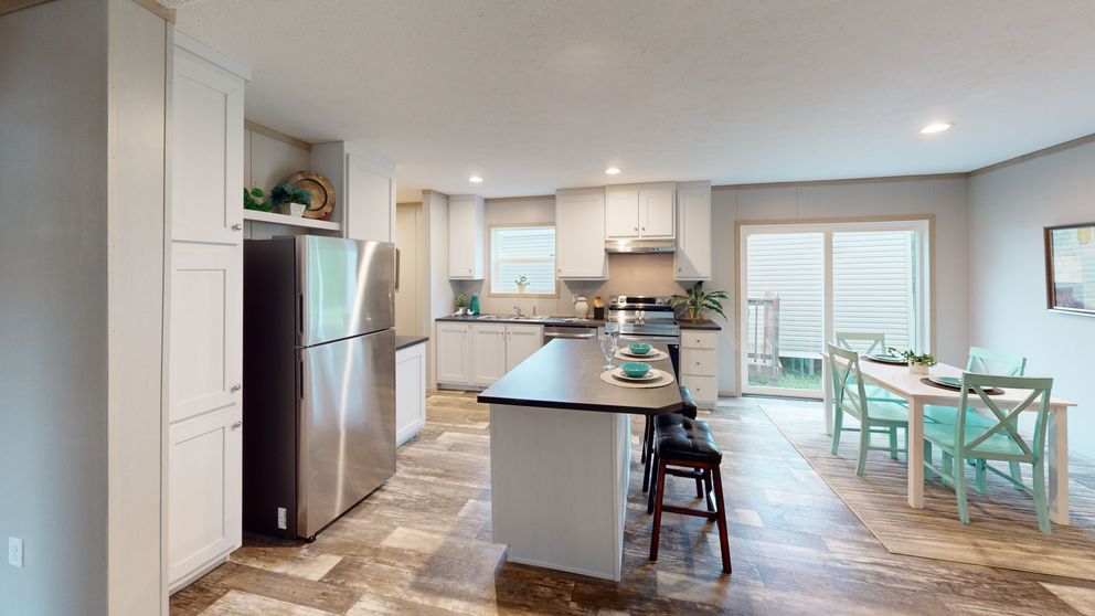 The FRANKLIN Kitchen. This Manufactured Mobile Home features 3 bedrooms and 2 baths.