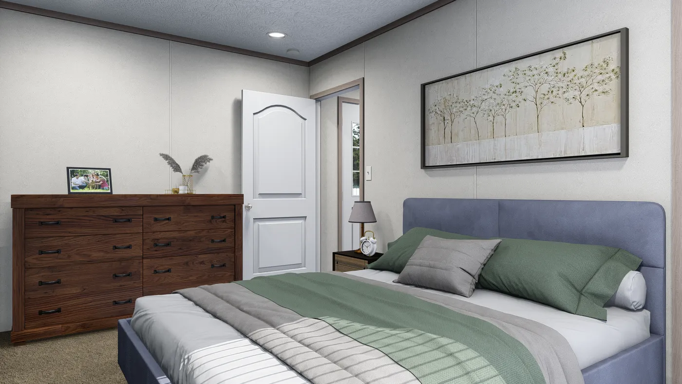 The 5616-4779 THE PULSE Primary Bedroom. This Manufactured Mobile Home features 2 bedrooms and 2 baths.