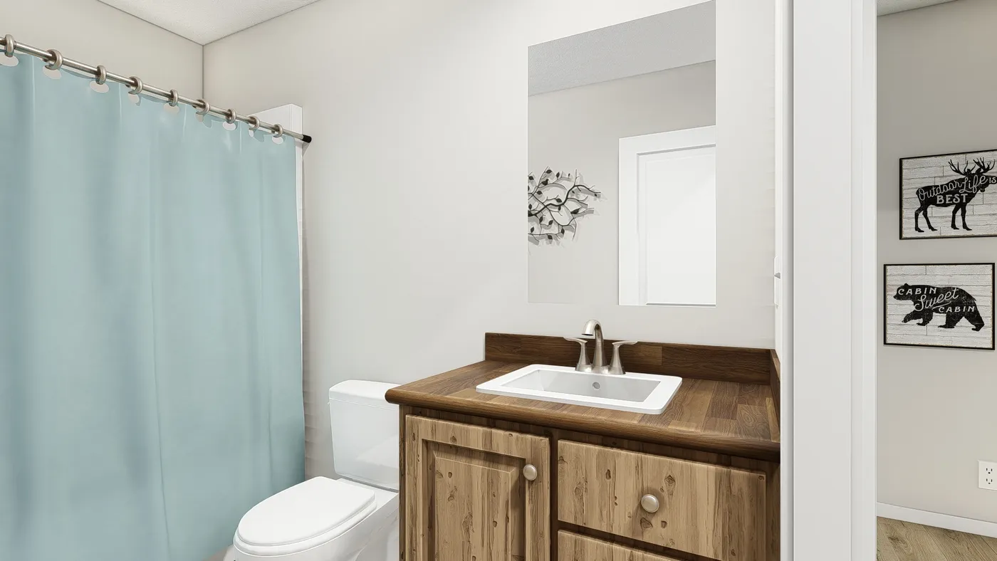 The DRM561M 56'              DREAM Guest Bathroom. This Manufactured Mobile Home features 2 bedrooms and 1 bath.