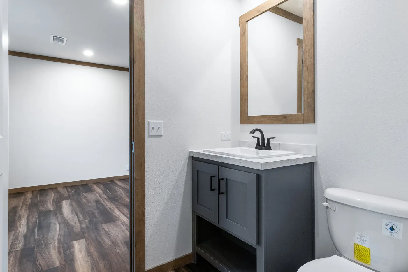 The EVERETT ELITE Guest Bathroom. This Manufactured Mobile Home features 4 bedrooms and 3 baths.
