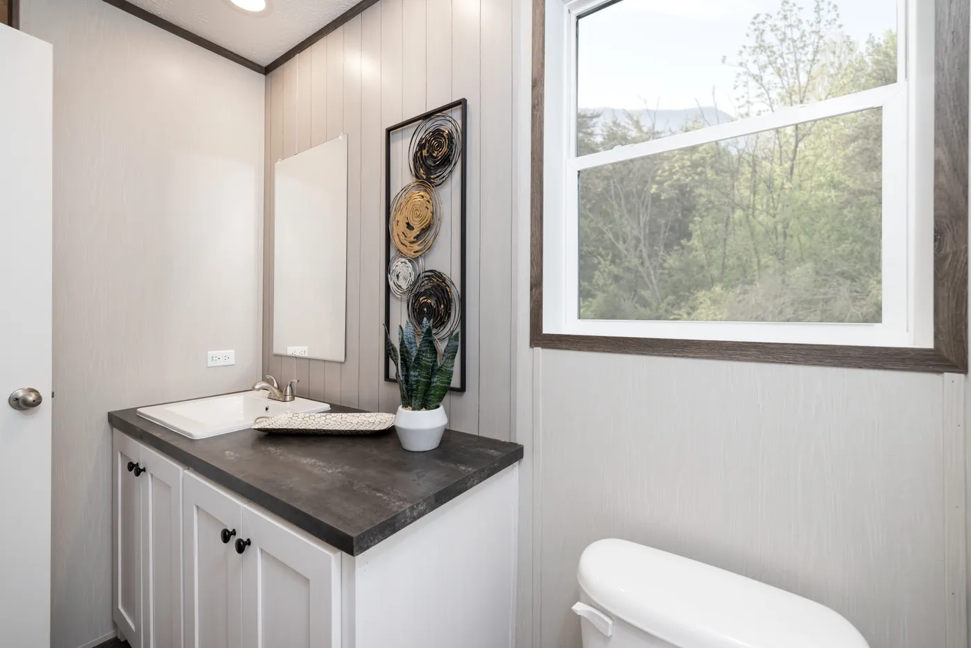 The INTUITION Guest Bathroom. This Manufactured Mobile Home features 3 bedrooms and 2 baths.