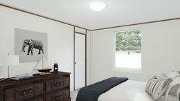The EXCITEMENT Guest Bedroom. This Manufactured Mobile Home features 3 bedrooms and 2 baths.