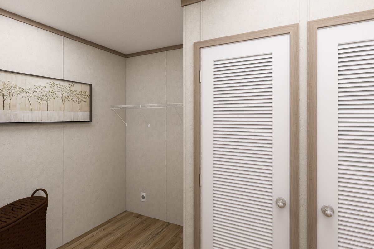 The 6616-CC03 HARBORVIEW 66 Utility Room. This Manufactured Mobile Home features 3 bedrooms and 2 baths.