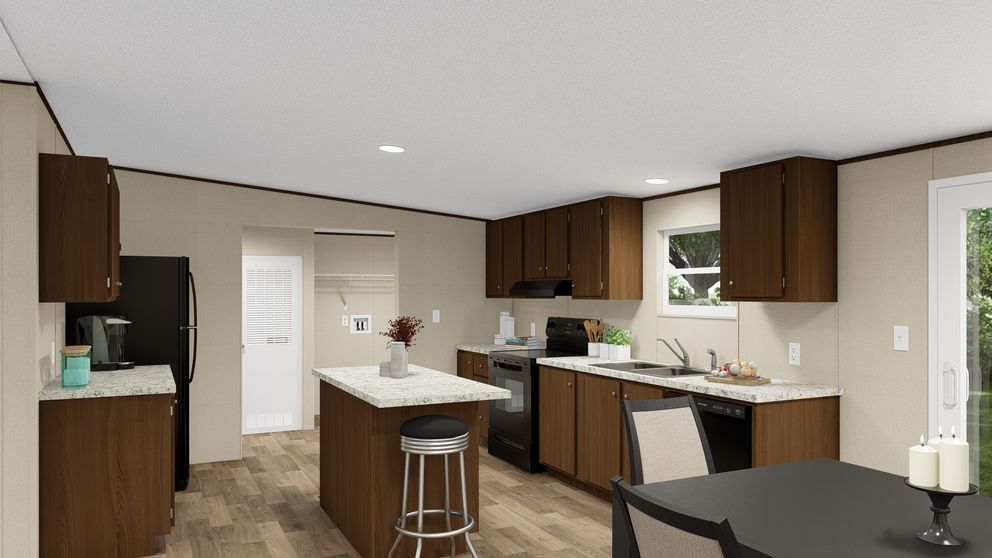 The THRILL Kitchen. This Manufactured Mobile Home features 3 bedrooms and 2 baths.