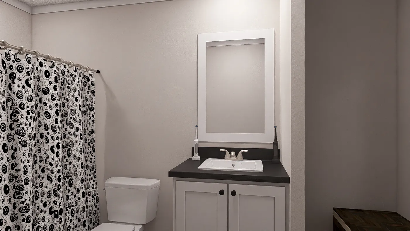 The WHOLE LOTTA LOVE Guest Bathroom. This Manufactured Mobile Home features 3 bedrooms and 2 baths.