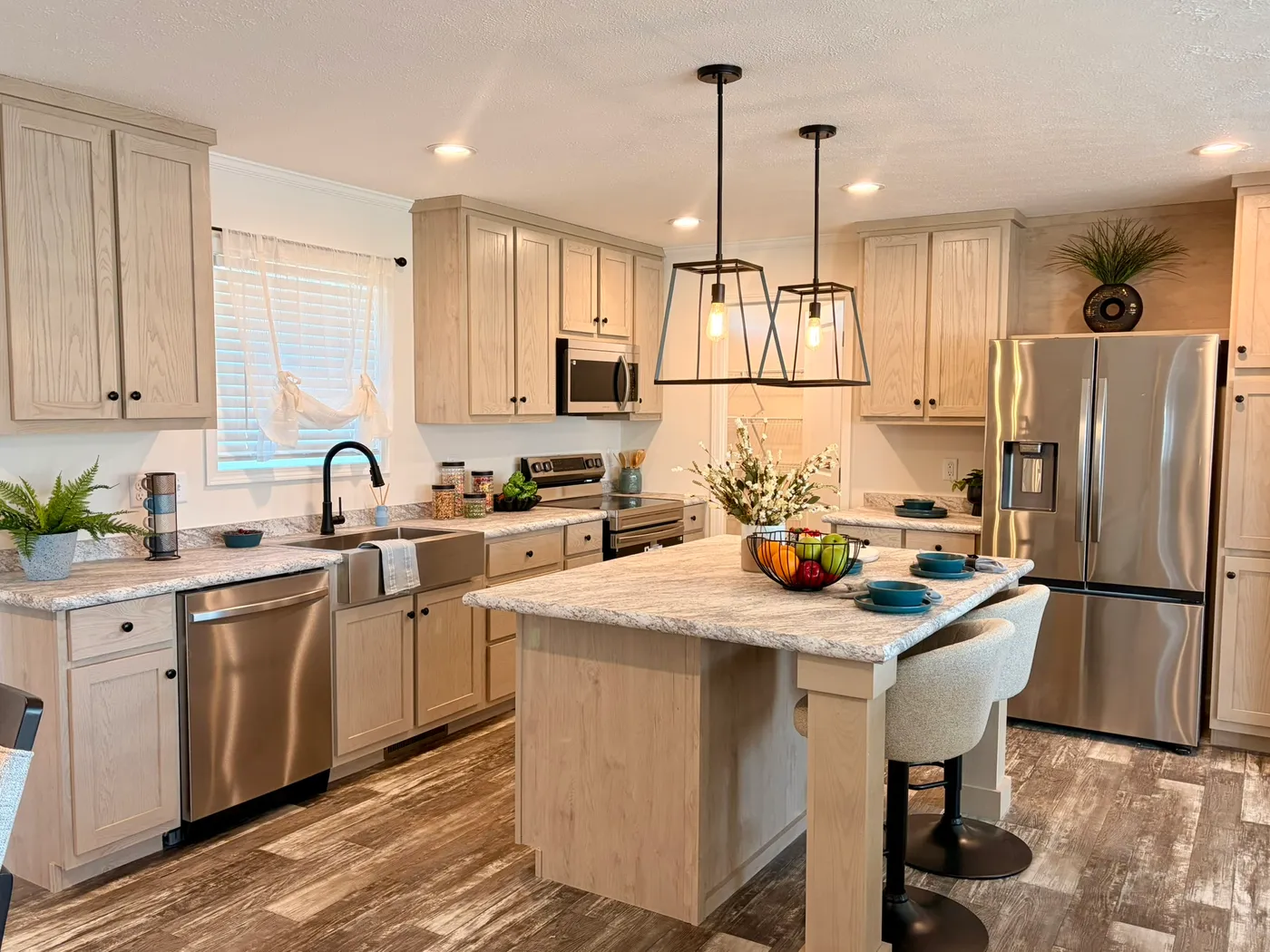 The TOURMALINE 7628-649 Kitchen. This Manufactured Mobile Home features 4 bedrooms and 2 baths.