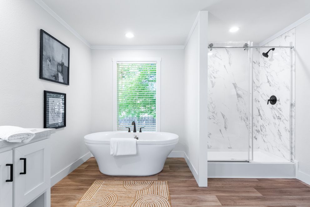 The FARM 4 FLEX ELITE Primary Bathroom. This Manufactured Mobile Home features 4 bedrooms and 3 baths.