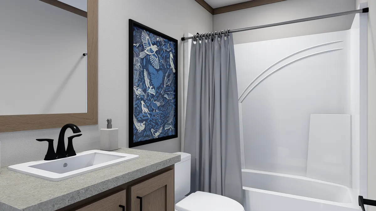 The ISABELLA Guest Bathroom. This Manufactured Mobile Home features 3 bedrooms and 2 baths.
