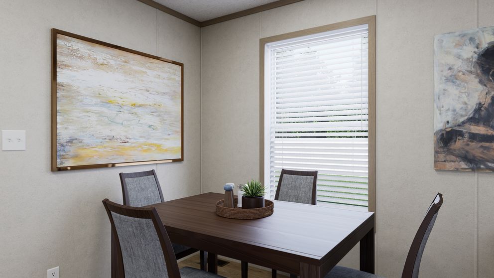 The 6014-CC02 CLEARPATH 60 Dining Room. This Manufactured Mobile Home features 2 bedrooms and 2 baths.