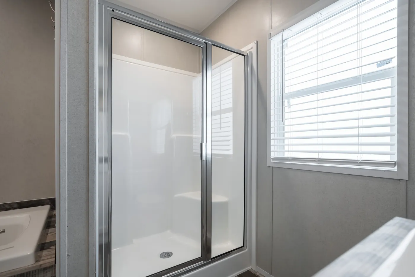 The WILLOW Primary Bathroom. This Manufactured Mobile Home features 3 bedrooms and 2 baths.