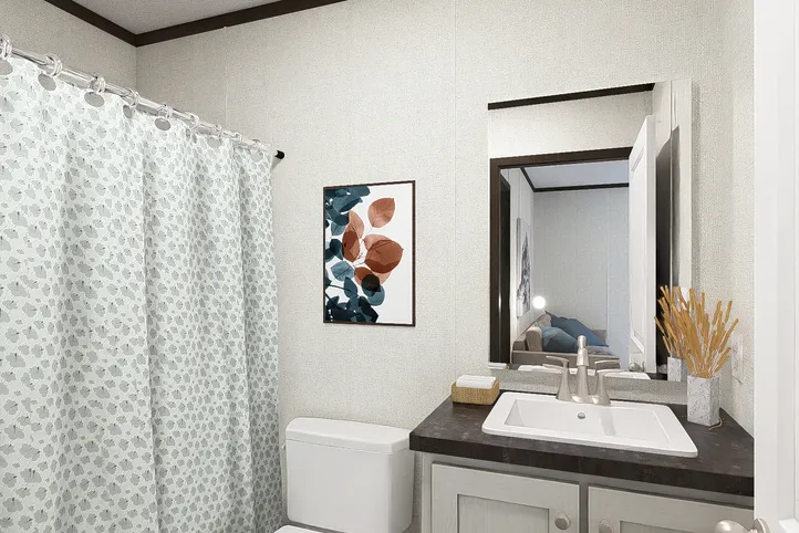 The BALANCE Guest Bathroom. This Manufactured Mobile Home features 3 bedrooms and 2 baths.
