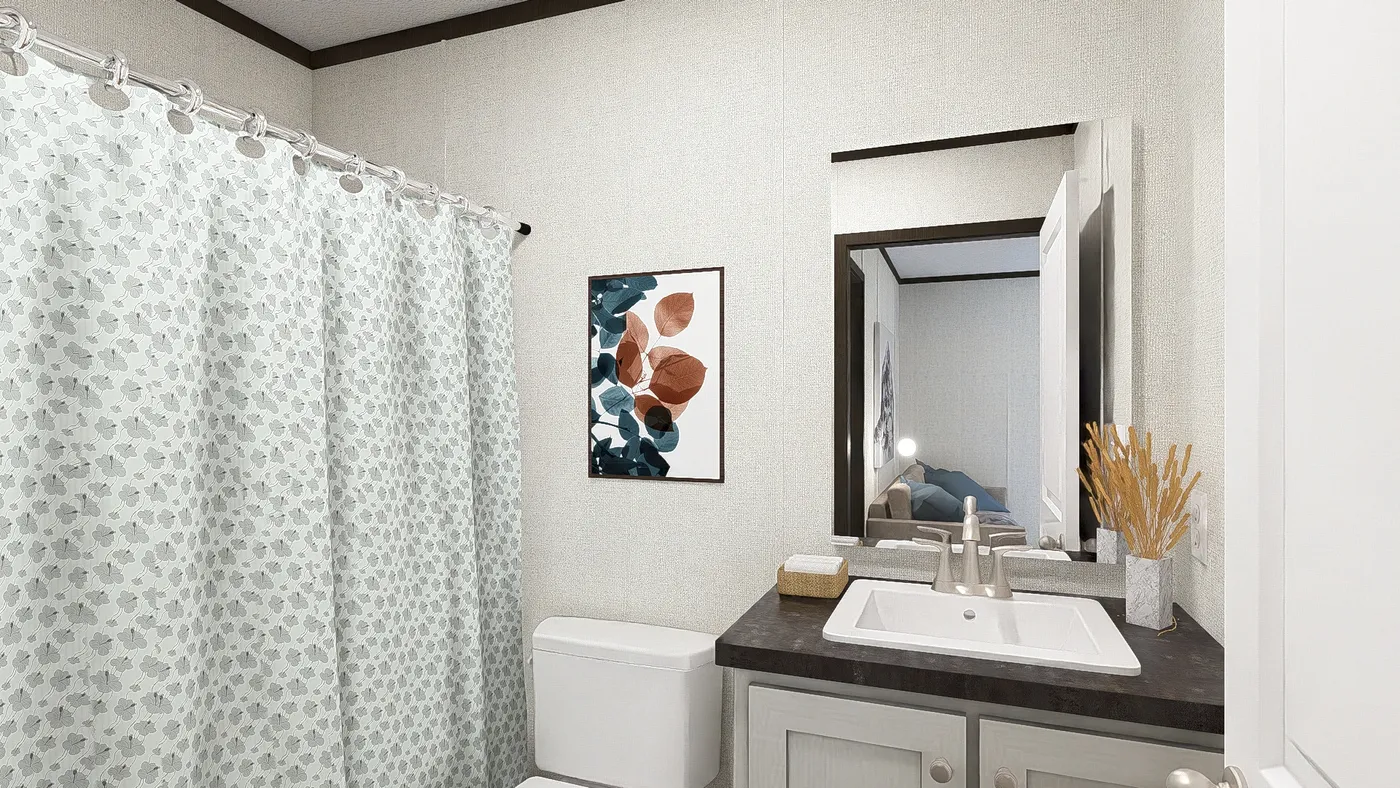 The BALANCE Guest Bathroom. This Manufactured Mobile Home features 3 bedrooms and 2 baths.