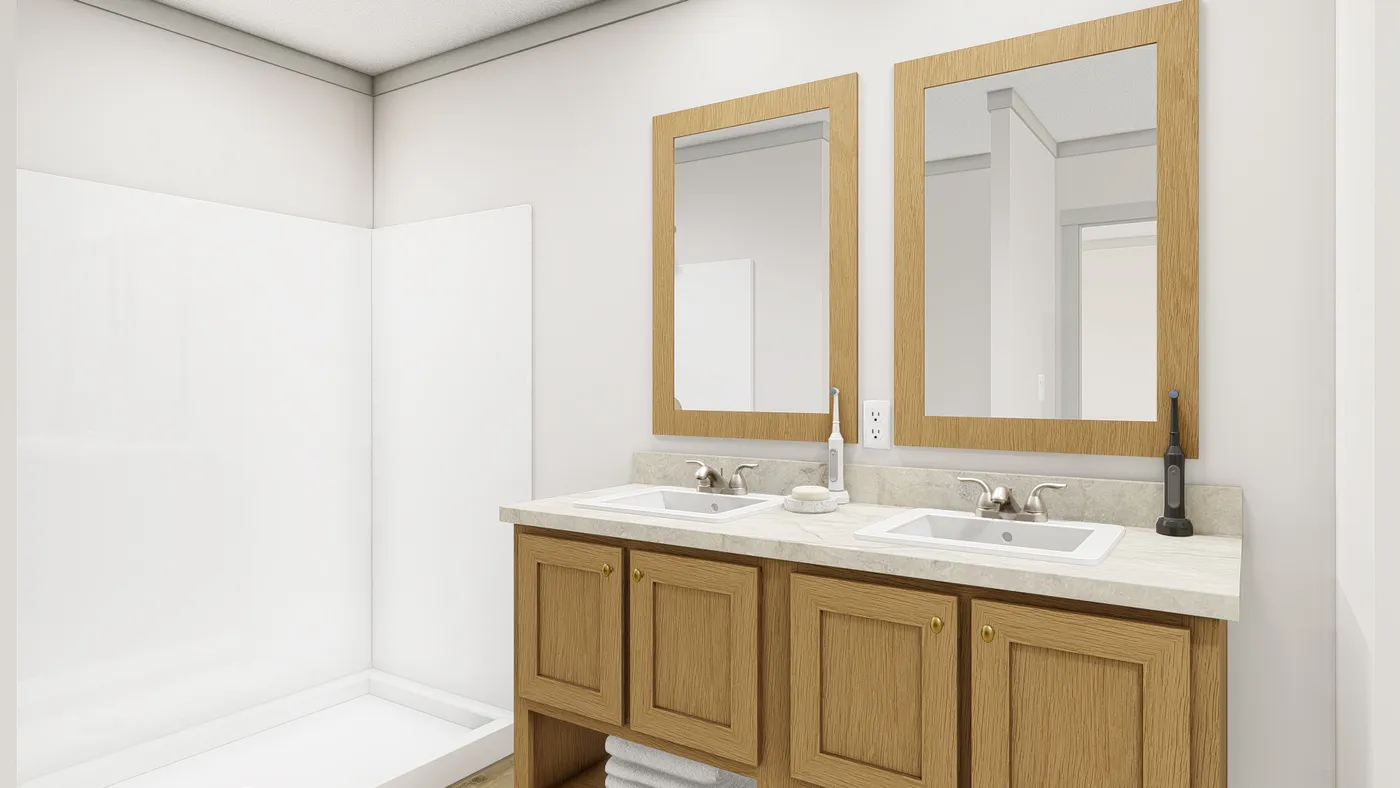 The SWEET CAROLINE Primary Bathroom. This Manufactured Mobile Home features 3 bedrooms and 2 baths.