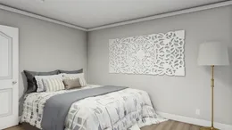 The THE BREEZE Bedroom. This Manufactured Mobile Home features 3 bedrooms and 2 baths.
