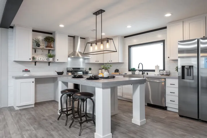 The BREEZE FARMHOUSE Kitchen. This Manufactured Mobile Home features 3 bedrooms and 2 baths.