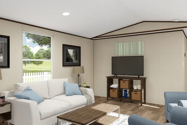 The GLORY Living Room. This Manufactured Mobile Home features 3 bedrooms and 2 baths.