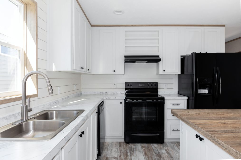 The TRUMAN Kitchen. This Manufactured Mobile Home features 4 bedrooms and 2 baths.
