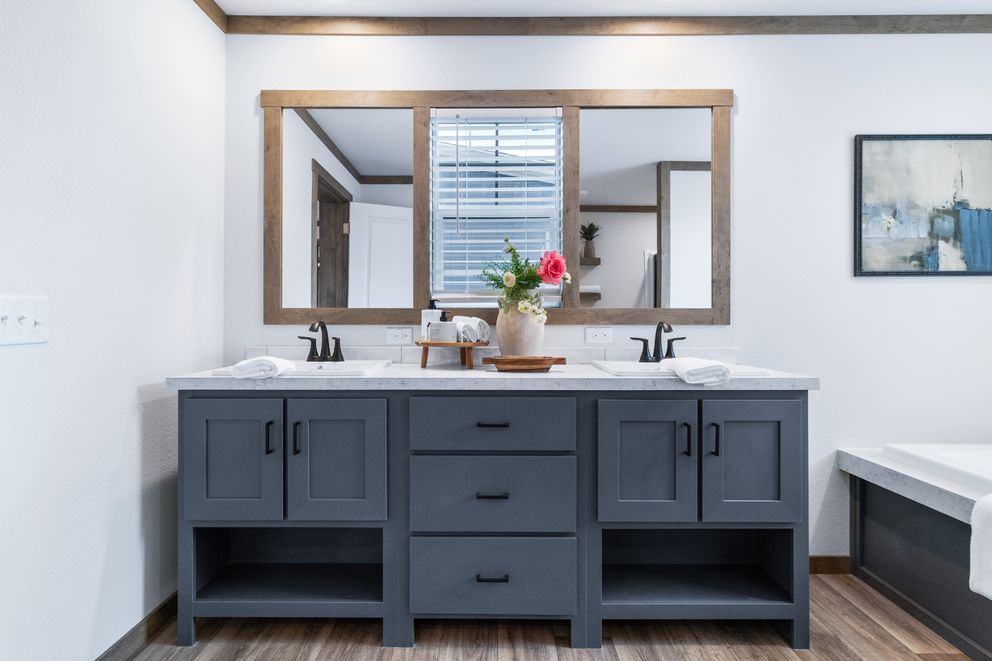 The FARM 3 FLEX Primary Bathroom. This Manufactured Mobile Home features 3 bedrooms and 2 baths.