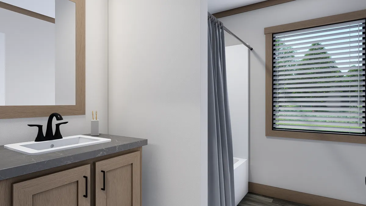 The FARM 3 FLEX Guest Bathroom. This Manufactured Mobile Home features 4 bedrooms and 3 baths.