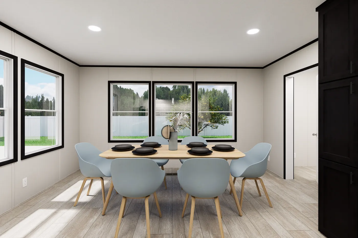 The ULTRA FLEX JEWEL GRANDE Dining Area. This Manufactured Mobile Home features 4 bedrooms and 2 baths.