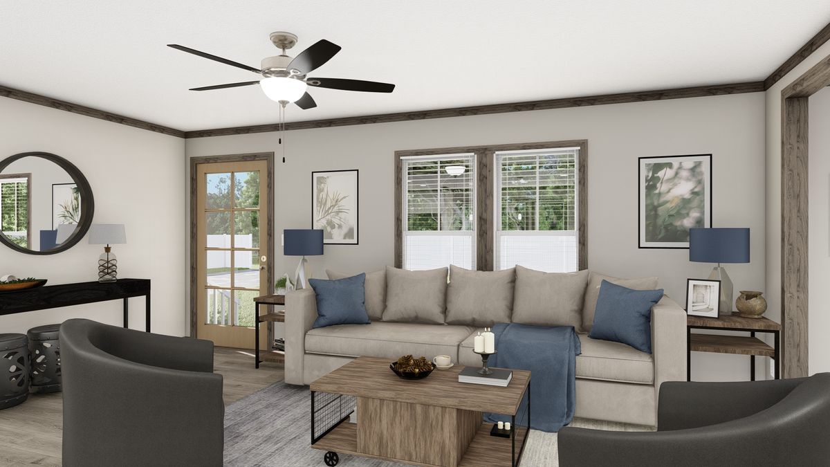 The THE MADISON Living Room. This Manufactured Mobile Home features 3 bedrooms and 2 baths.