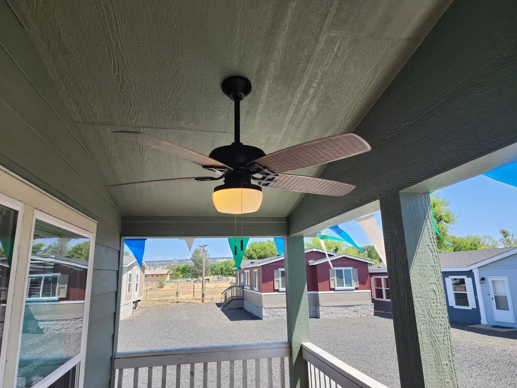 Two ceiling fans on porch.