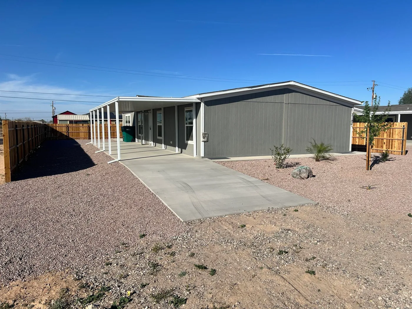 concrete drive and carport awning
