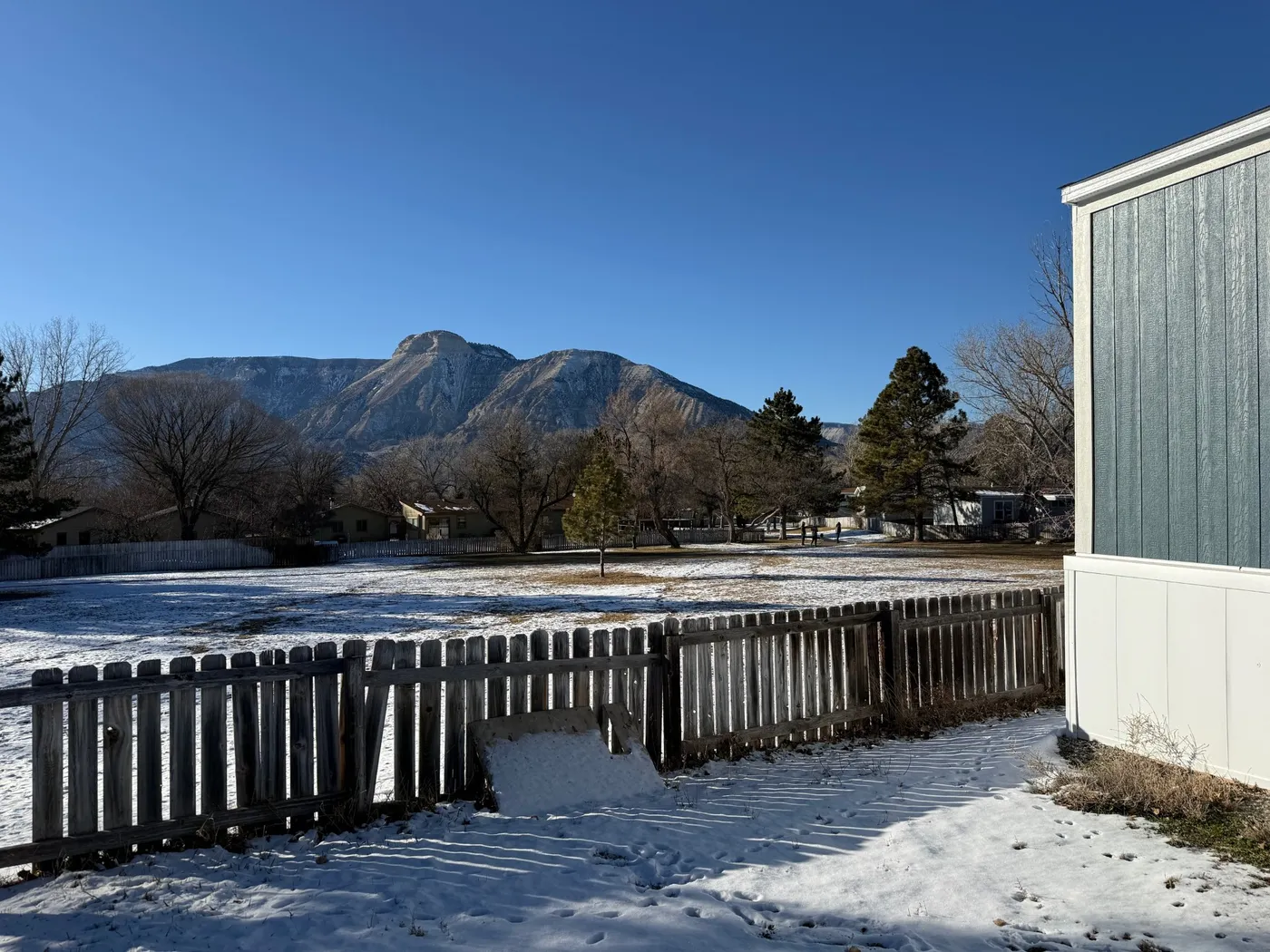 Large open space behind home for kids to play or gather with friends. 