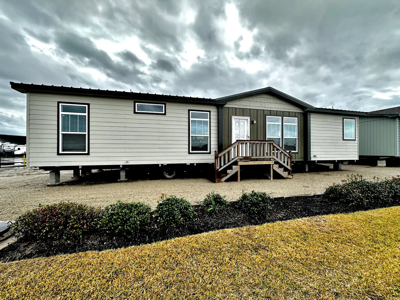 Step into luxury with this beautiful 3 bedroom, 2 bathroom doublewide mobile home offering 1,792 sq ft of spacious, upscale living. This modern manufactured home features an open-concept design with vaulted ceilings, crown molding, and tape and textured walls for a residential-style finish.

The gourmet kitchen includes granite countertops, stainless steel appliances, a large workspace, and a convenient walk-in pantry, perfect for cooking and entertaining. Throughout the home, you’ll find walk