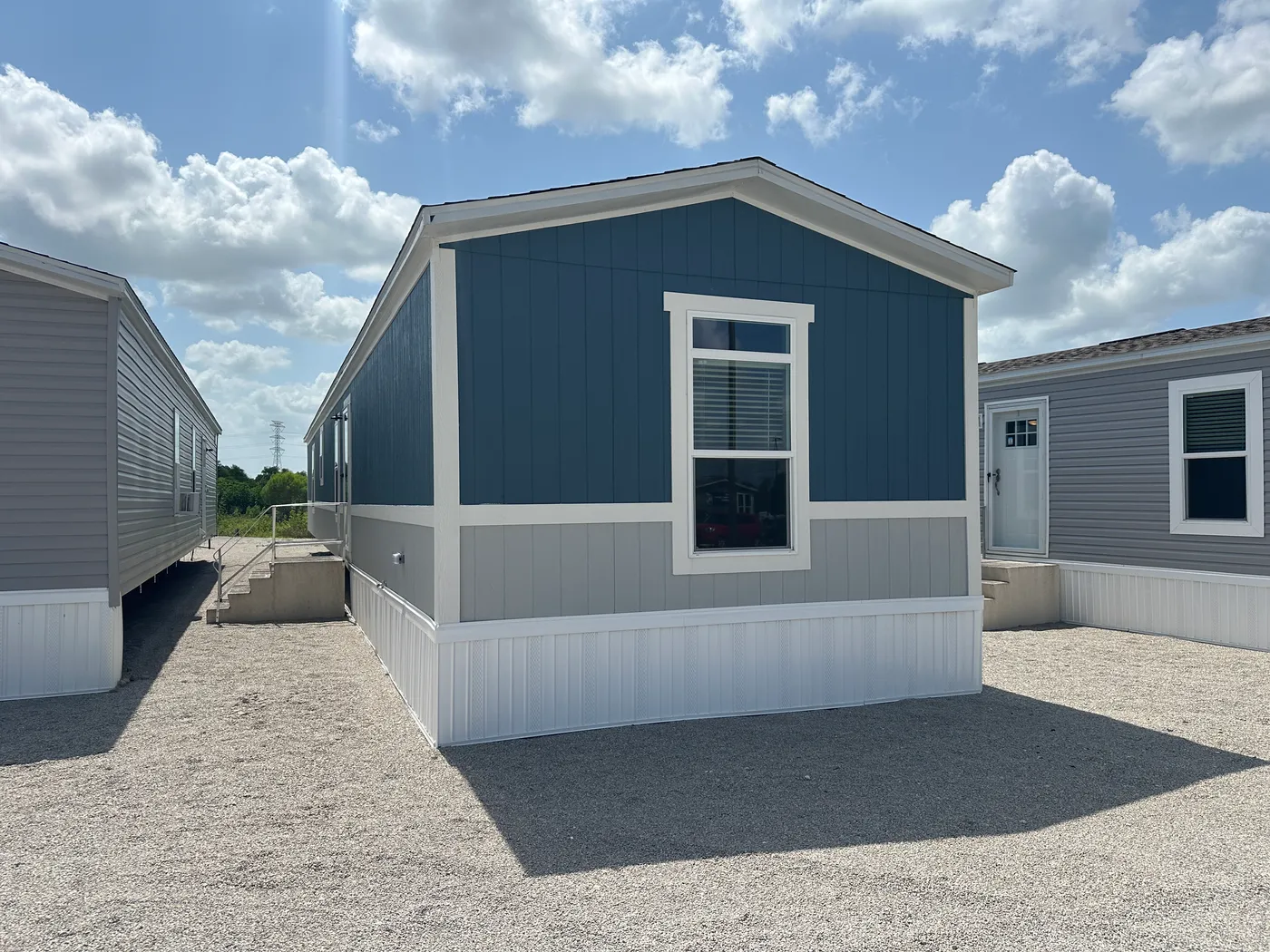 Introducing The Harvest, a beautiful 3 bedroom, 2 bathroom manufactured home with 1,216 sq. ft. of comfortable living space. This home is packed with popular upgrades, including a stainless steel farmhouse sink, a spacious kitchen design, built-in entertainment system, and upflow vents for added comfort and better furniture placement.

The private primary suite features a large garden soaking tub and separate walk-in shower, giving you the perfect place to relax after a long day. On the outsid