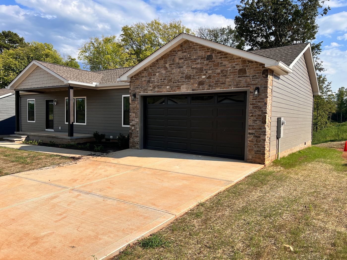 The stone on the garage really sets this home apart.