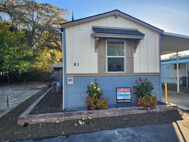 Great low maintenance curb appeal & landscaping