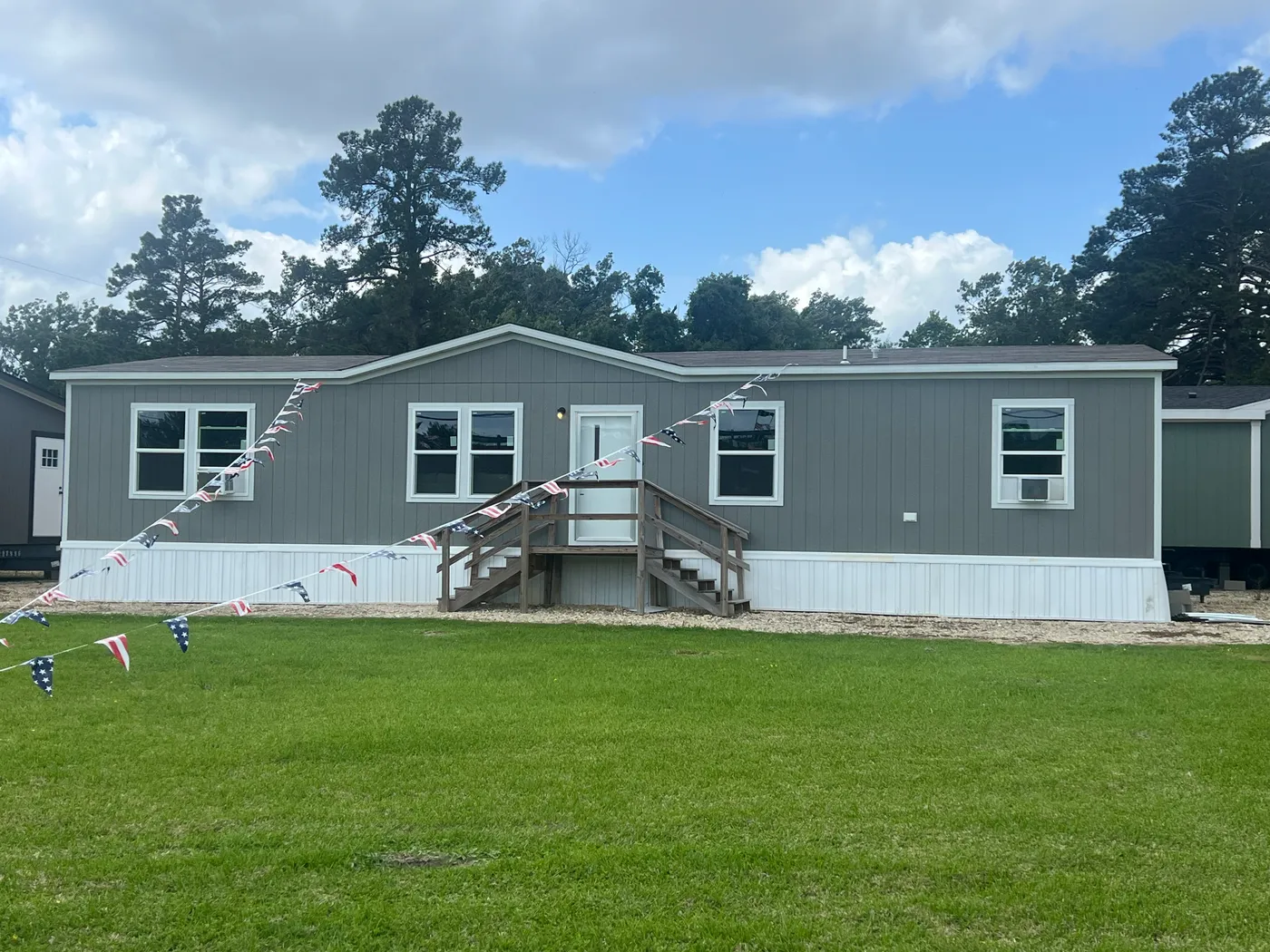 Exterior of the Oak with beautiful grey smart panel siding as an option