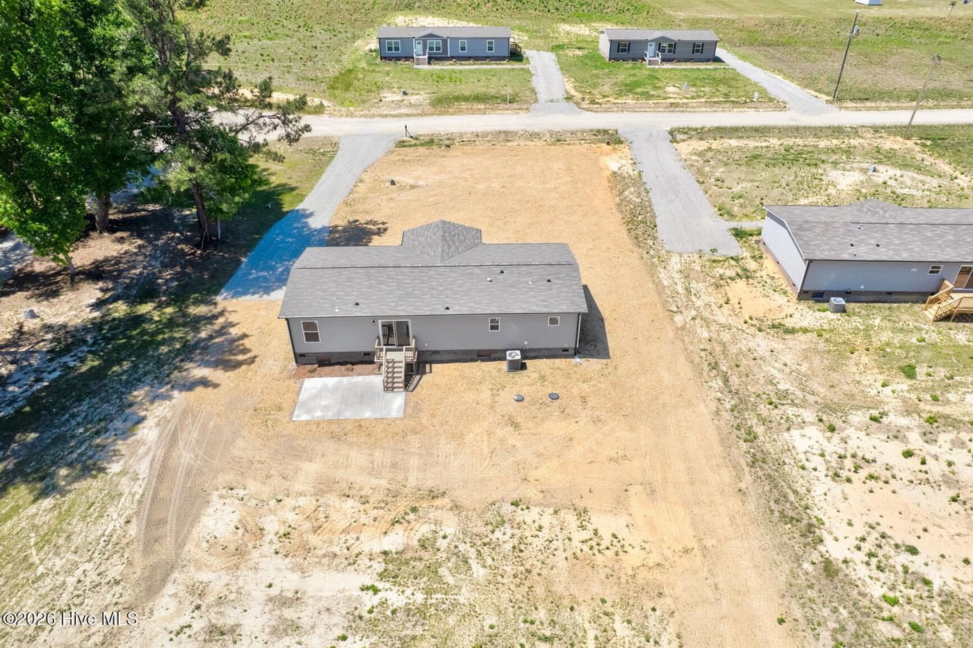 aerial view back of home and back yard 
