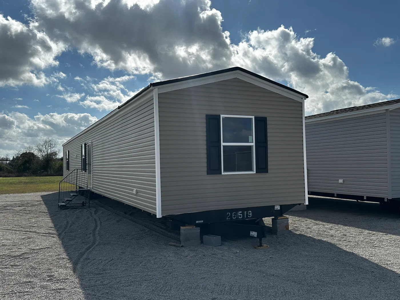 Discover the best value in affordable housing with this spacious 3 bedroom, 2 bath manufactured home, one of the largest and most affordable floor plans available. Designed for comfort and functionality, this energy-efficient mobile home features a large open layout, spacious bedrooms, and modern living areas perfect for families. The kitchen comes fully equipped with a refrigerator, stove, and dishwasher, making move-in easy and convenient. Built for efficiency and long-term savings, this home 