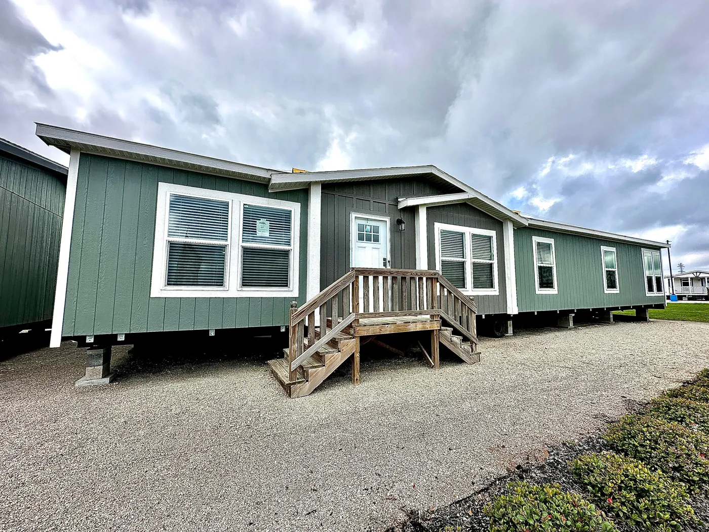 Spacious 3 bedroom, 2 bathroom manufactured home designed for comfort, style, and modern living. This large floor plan features both a welcoming living room and oversized den, perfect for entertaining or extra family space. Enjoy abundant natural light from huge energy-efficient windows throughout the home. The open kitchen includes stainless steel appliances and a huge kitchen island, ideal for cooking and gatherings. The private primary suite offers a large tiled walk-in shower for a luxury fe