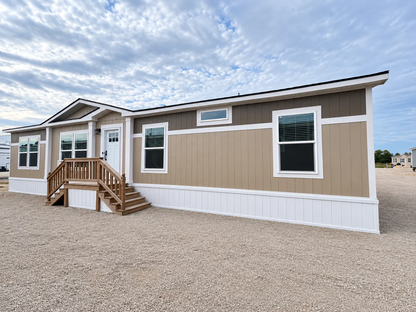 Discover The Heritage, a beautiful 3-bedroom, 2-bath manufactured home offering 1,568 square feet of spacious, functional living at Clayton Homes of Alvin, Texas! This stunning home features a spacious open-concept living room, a modern kitchen with an oversized multifunctional island, and a beautiful built-in fireplace. Enjoy a thoughtfully designed private split-bedroom floor plan, offering comfort and separation for the entire family. The oversized utility and laundry room features a convenie