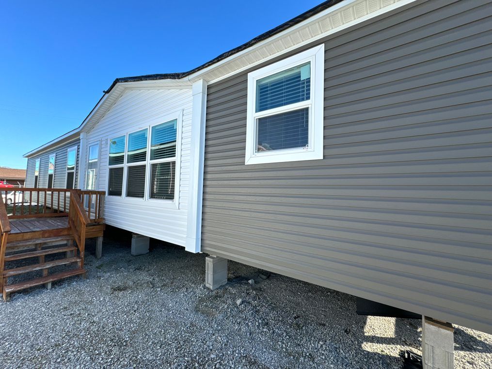 Shadow exterior, with white accent around door.