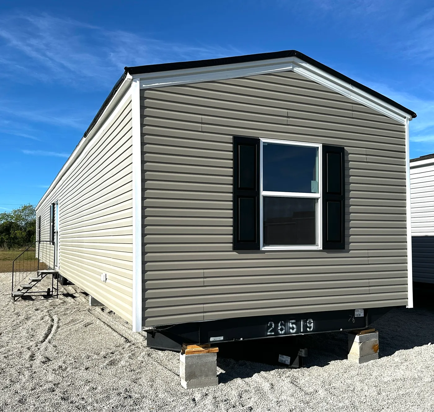 Discover the best value in affordable housing with this spacious 3 bedroom, 2 bath manufactured home, one of the largest and most affordable floor plans available. Designed for comfort and functionality, this energy-efficient mobile home features a large open layout, spacious bedrooms, and modern living areas perfect for families. The kitchen comes fully equipped with a refrigerator, stove, and dishwasher, making move-in easy and convenient. Built for efficiency and long-term savings, this home 