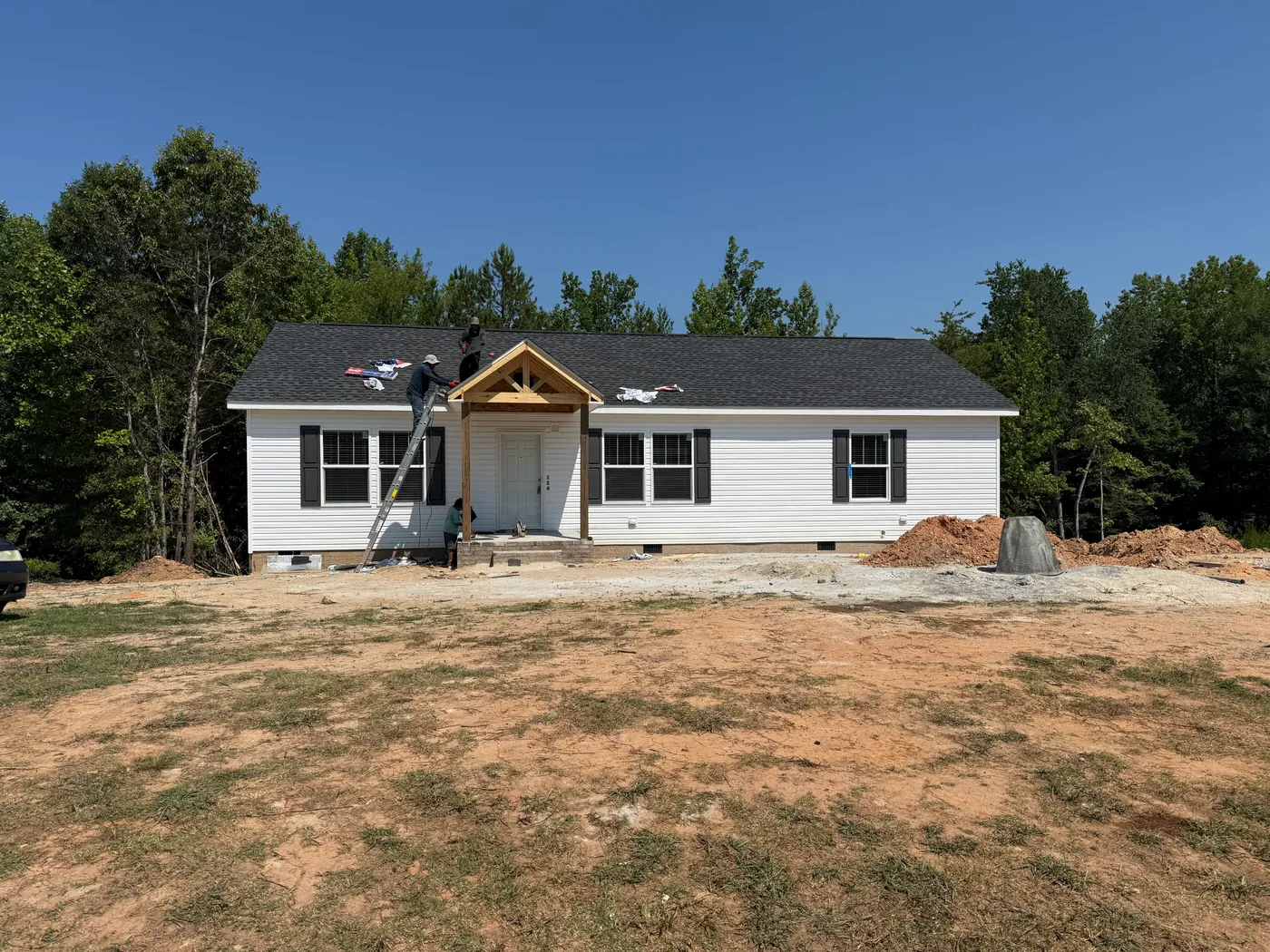 Covered front porch in progress.  