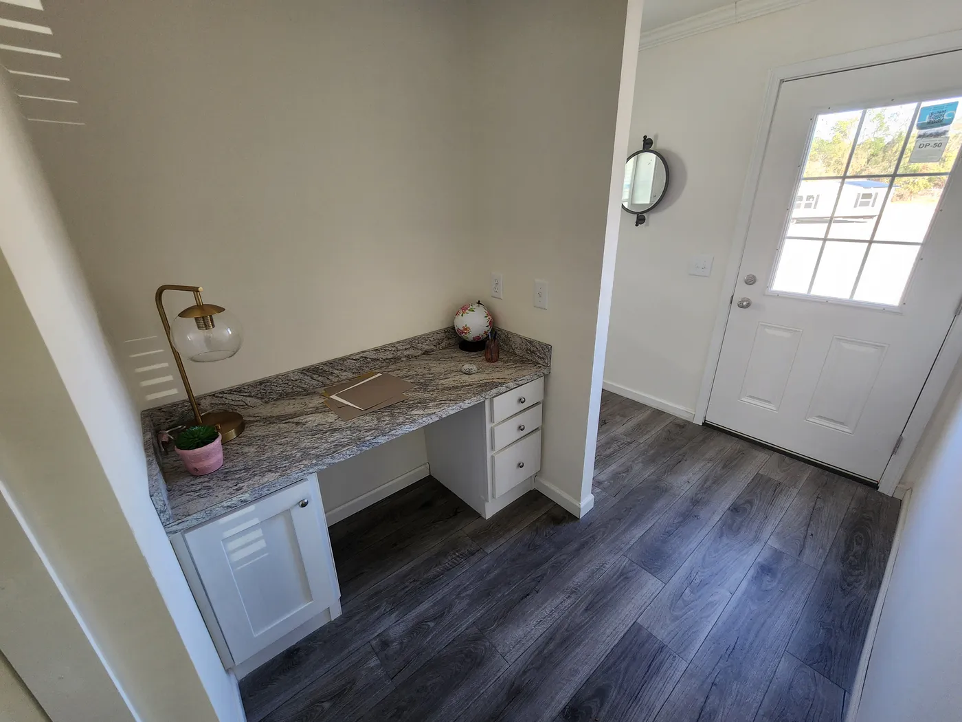 Hall desk, can be swapped for optional freezer space