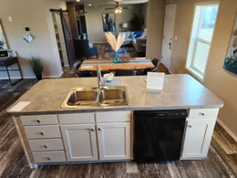 Island kitchen with drawers and cabinets