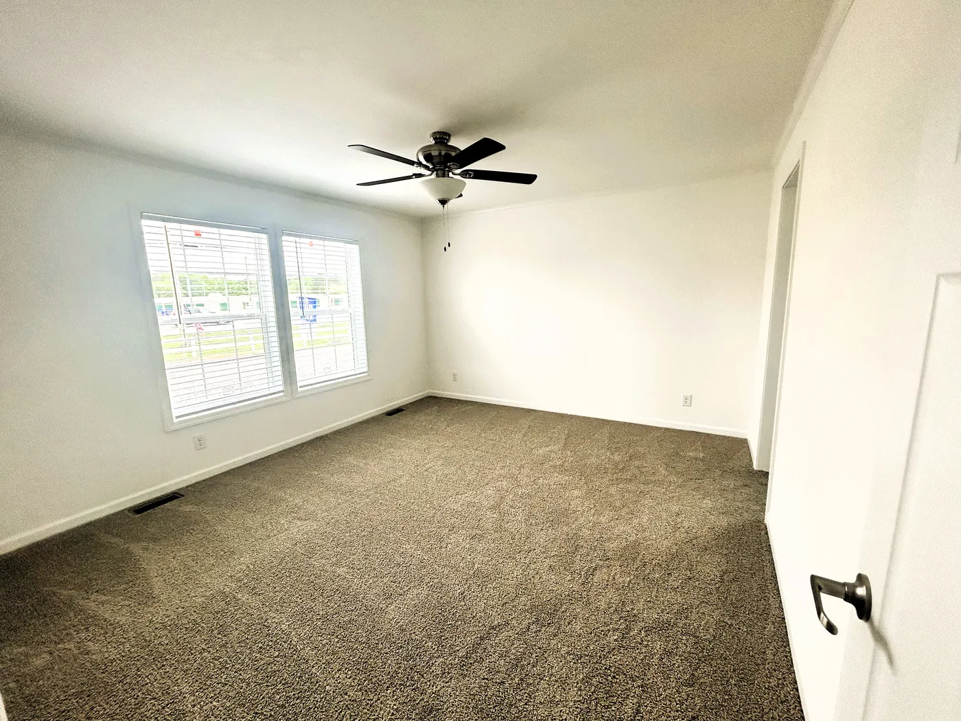 Walking into the main bedroom, the natural lighting is incredible. 