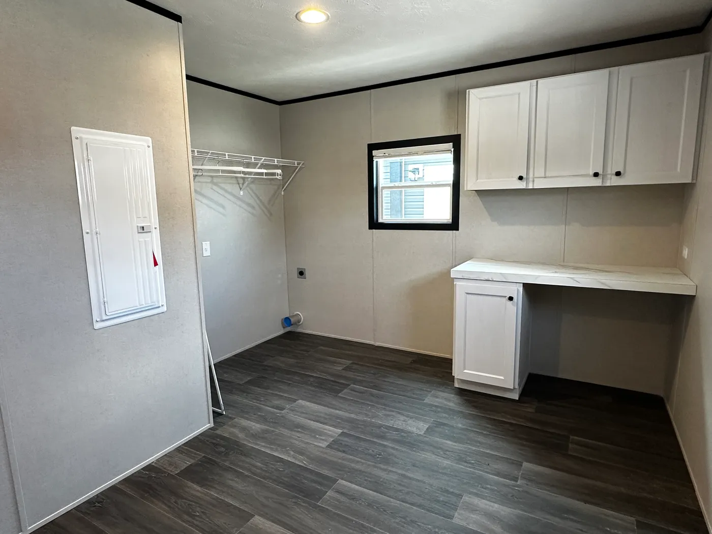 Spacious 4 bedroom 2 bath double wide manufactured home with massive square footage and modern design. Features an open floor plan with a large living room and separate den, perfect for entertaining or family living. The master suite offers a relaxing garden soaking tub, tiled-in walk-in shower, and plenty of space. Enjoy a cozy built-in fireplace, stylish finishes, and energy-efficient construction. This affordable mobile home is ideal for families seeking space, comfort, and value.