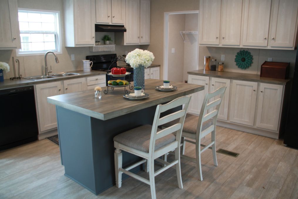 Kitchen with stainless Steel Appliances and an island