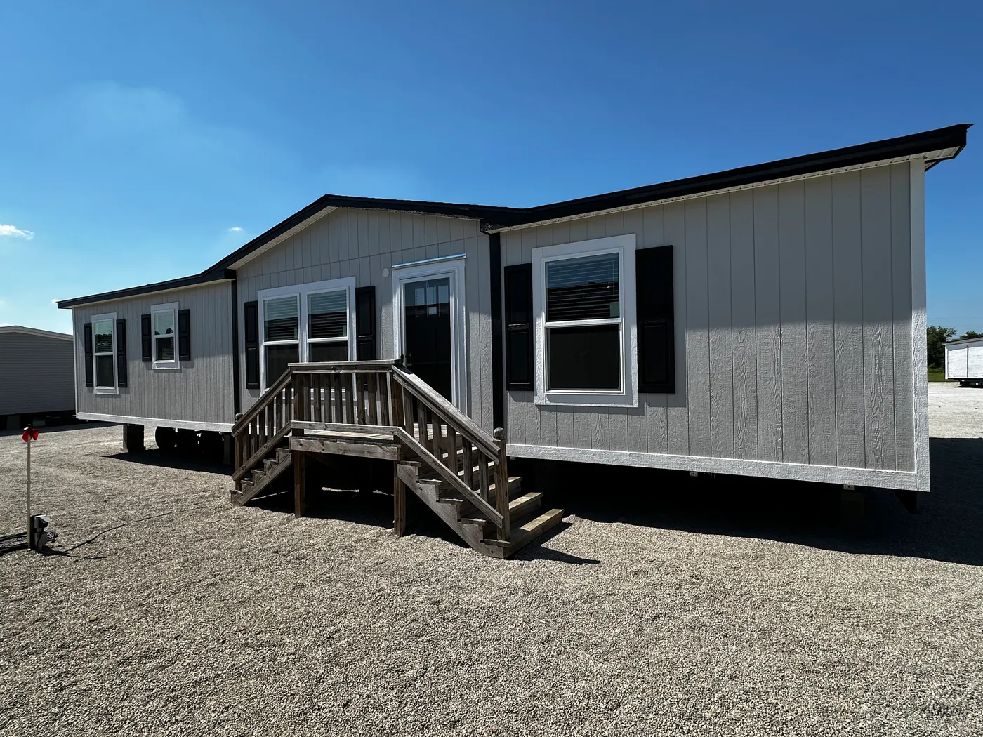 extra wide doublewide mobile home, 32x52 manufactured home, SmartPanel siding mobile home, open floorplan manufactured home, energy-efficient doublewide, walk-in shower mobile home, walk-in closet master bedroom, spacious manufactured home for sale.
