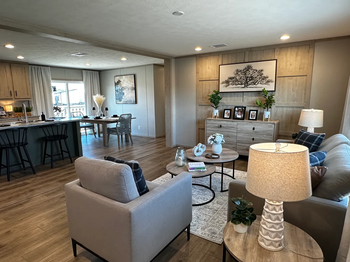 Spacious 3 bedroom, 2 bathroom double wide manufactured home built for comfort and family living. This open layout features both a living room and separate den, perfect for movie nights, entertaining, or creating private space for kids and adults. The modern kitchen includes stainless steel appliances and ample cabinet space. Enjoy year-round comfort with energy-efficient upflow ceiling vents for improved airflow. The private primary suite offers a relaxing retreat with a large soaking tub and s