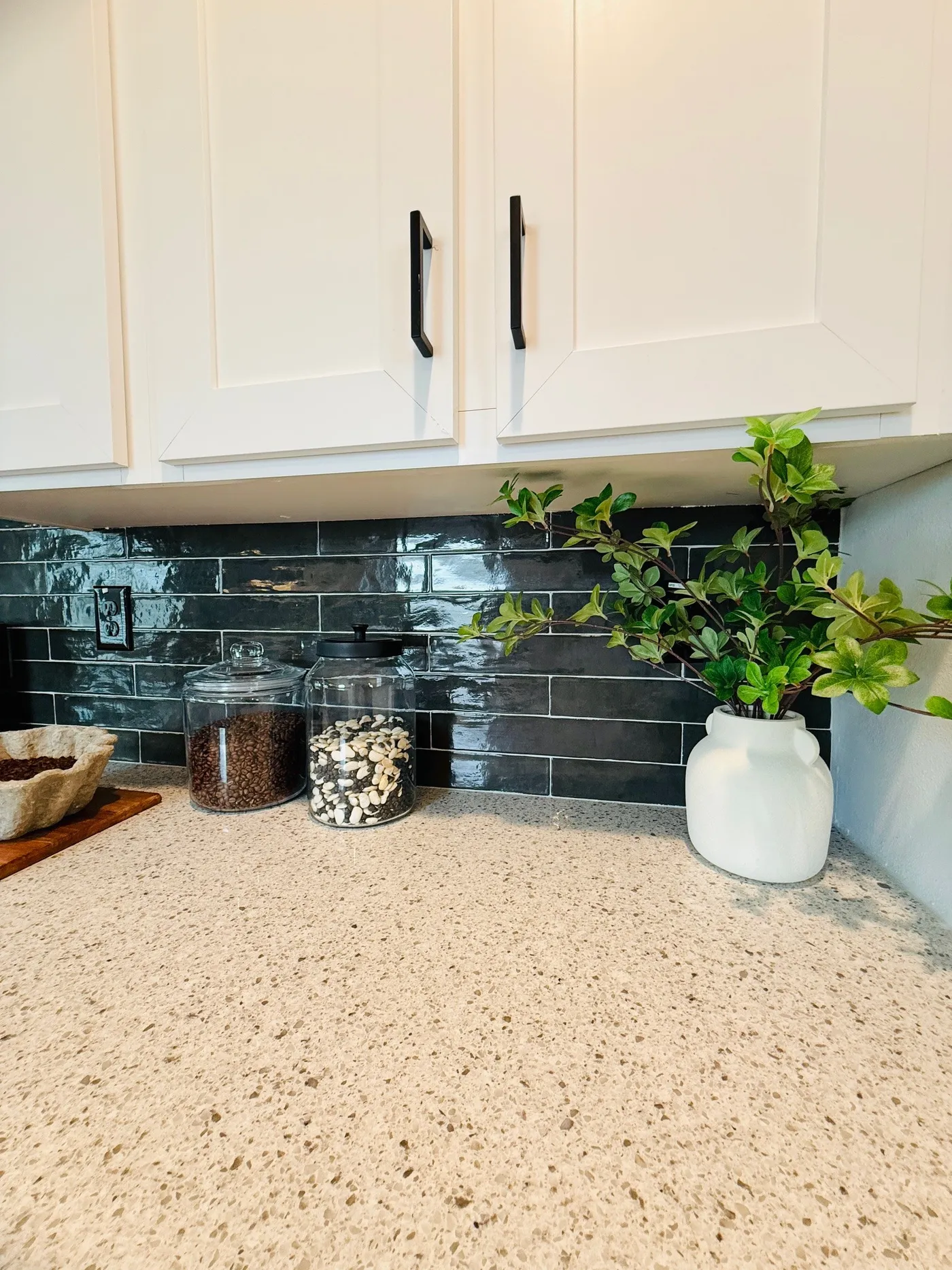 From the beautiful countertops to the stylish tile backsplash and modern cabinetry, every detail in this kitchen was designed to create a clean, upscale look.