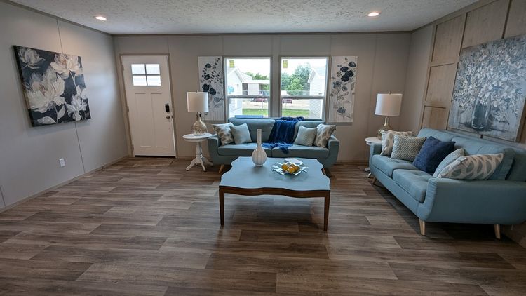 Front door entry into spacious living room.