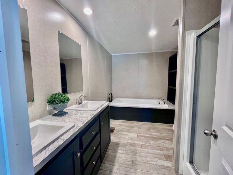 A luxurious 72" Soaker Tub and a Separate Shower. 